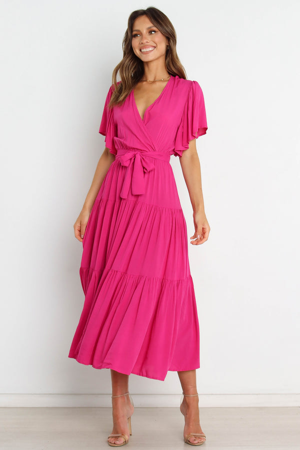 DRESSES Barker Dress - Pink Midi length, flutter sleeve, wrap dress in bright pink fushia. V-Neck line with a bow to complete the wrap waist look. Perfect for wedding guests, baby showers and sprinkles, day dates, hens parties and more! A luxe yet affordable staple for every woman's closet. 